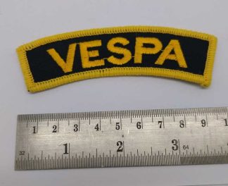 VESPA PATCH GOLD ON BLACK 2.5 X 10 CM APPROX