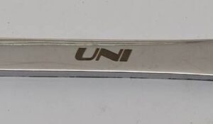 GEAR TIE BAR BONE SHAPE STAINLESS UNI